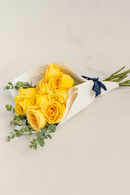 Ramo 9 Rosas Amarillas - Envoltura Yute PTO. ESCOND.