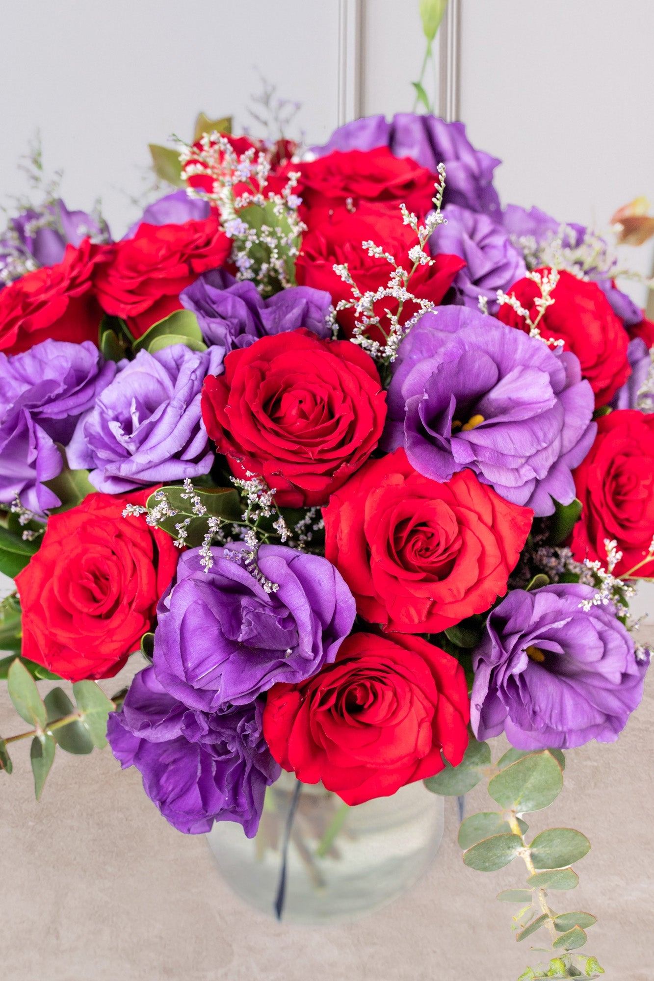 París - Rosa Roja y Lisianthus Morado Cun