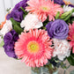 Coral - Gerbera Rosa, Lisianthus Morado y Clavel Rosa